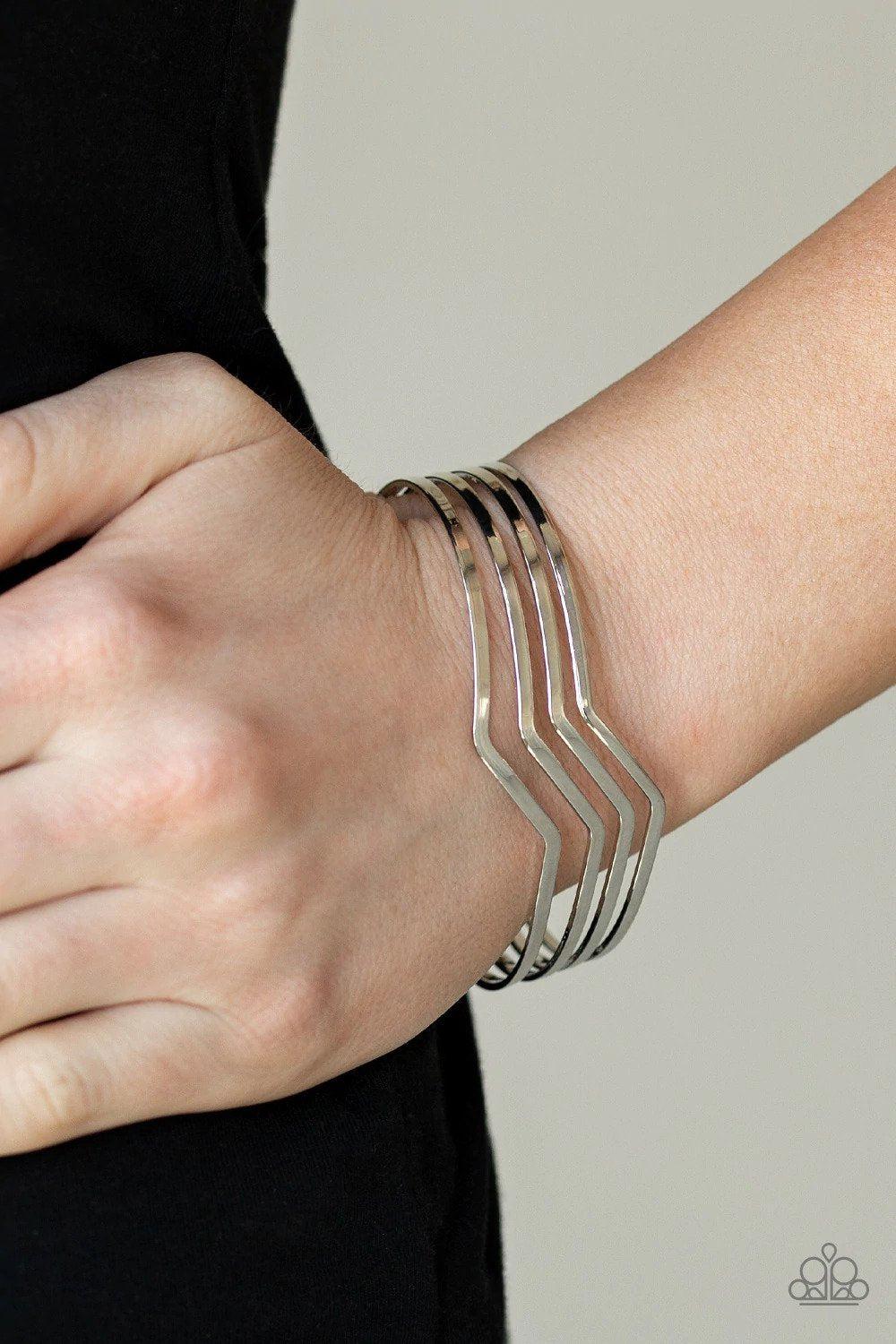 Waverunner Silver Cuff Bracelet - Paparazzi Accessories- on model - CarasShop.com - $5 Jewelry by Cara Jewels