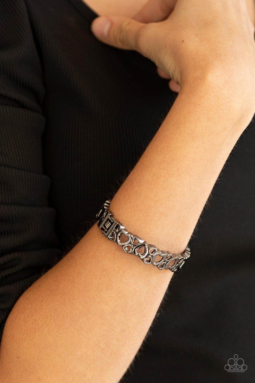 You HEART The Lady! Gunmetal Black Hinged Bangle Bracelet - Paparazzi Accessories - model -CarasShop.com - $5 Jewelry by Cara Jewels